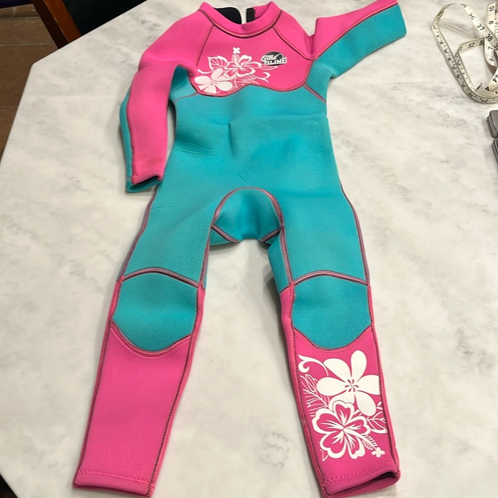 Kid wetsuit for ocean swimming.